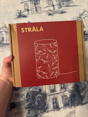 IKEA STRÅLA table lamp featuring a bird and berry pattern